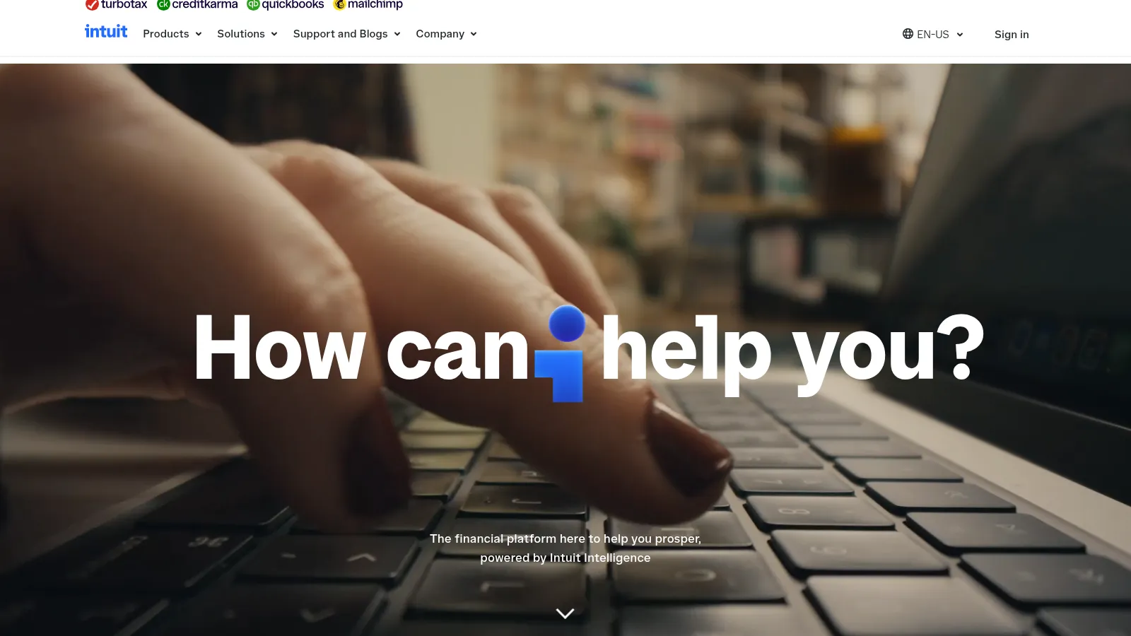 The Intuit.com homepage: "How can I help you?", with the I set as Intuit's blue mark, above "The financial platform here to help you prosper, powered by Intuit Intelligence"